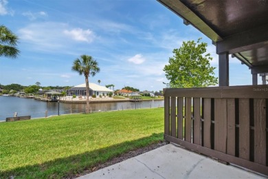 Don't miss this rare opportunity to own a light-filled on Palm Harbor Golf Club in Florida - for sale on GolfHomes.com, golf home, golf lot