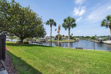 Don't miss this rare opportunity to own a light-filled on Palm Harbor Golf Club in Florida - for sale on GolfHomes.com, golf home, golf lot