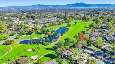 WOW. The door opens, and your attention is immediately drawn on Rancho San Joaquin Golf Course in California - for sale on GolfHomes.com, golf home, golf lot