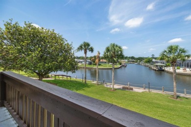 Don't miss this rare opportunity to own a light-filled on Palm Harbor Golf Club in Florida - for sale on GolfHomes.com, golf home, golf lot
