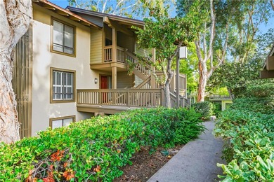 WOW. The door opens, and your attention is immediately drawn on Rancho San Joaquin Golf Course in California - for sale on GolfHomes.com, golf home, golf lot