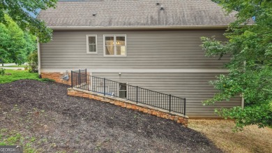 Welcome to your dream oasis at 67 Quartz Way, Dahlonega, nestled on Achasta Golf Club in Georgia - for sale on GolfHomes.com, golf home, golf lot