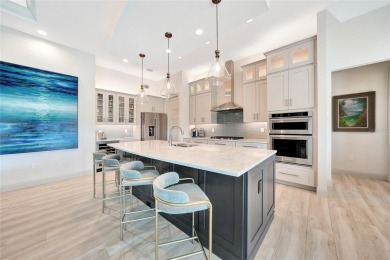 Welcome to this exquisite custom-built Harbor home, perfectly on Saint Andrews South Golf Club in Florida - for sale on GolfHomes.com, golf home, golf lot