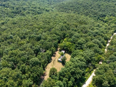 Here is an incredible opportunity to own a 6.44 M/L mostly on Lost Woods Golf Course in Missouri - for sale on GolfHomes.com, golf home, golf lot