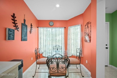 Light-Filled One-Level End Unit in Sun City! Tucked in a quiet on Okatie Creek Golf Club in South Carolina - for sale on GolfHomes.com, golf home, golf lot