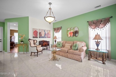 Light-Filled One-Level End Unit in Sun City! Tucked in a quiet on Okatie Creek Golf Club in South Carolina - for sale on GolfHomes.com, golf home, golf lot