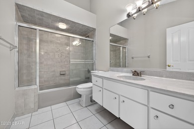 This Plantation Bay 4 bed, 4 bath, 3 car garage pool home is on Plantation Bay Golf and Country Club in Florida - for sale on GolfHomes.com, golf home, golf lot