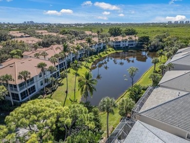 Set on a desirable corner lot with serene water and lush on Bonita Bay West in Florida - for sale on GolfHomes.com, golf home, golf lot