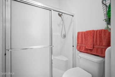 Light-Filled One-Level End Unit in Sun City! Tucked in a quiet on Okatie Creek Golf Club in South Carolina - for sale on GolfHomes.com, golf home, golf lot