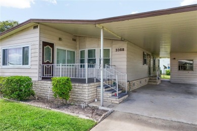 Well-maintained 2-bedroom, 2-bath manufactured home located in on Zellwood Station Country Club in Florida - for sale on GolfHomes.com, golf home, golf lot