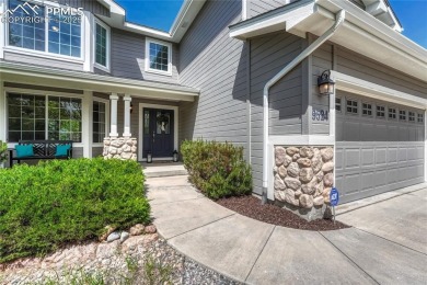 Nestled on a tree-lined street in the heart of District 20 and on Pine Creek Golf Club in Colorado - for sale on GolfHomes.com, golf home, golf lot