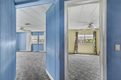 Well-maintained 2-bedroom, 2-bath manufactured home located in on Zellwood Station Country Club in Florida - for sale on GolfHomes.com, golf home, golf lot