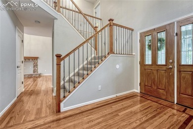 Nestled on a tree-lined street in the heart of District 20 and on Pine Creek Golf Club in Colorado - for sale on GolfHomes.com, golf home, golf lot