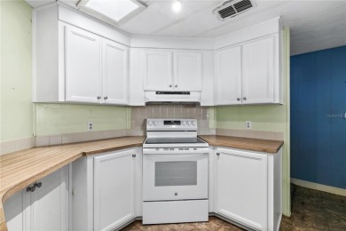 Well-maintained 2-bedroom, 2-bath manufactured home located in on Zellwood Station Country Club in Florida - for sale on GolfHomes.com, golf home, golf lot