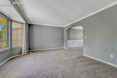 Nestled on a tree-lined street in the heart of District 20 and on Pine Creek Golf Club in Colorado - for sale on GolfHomes.com, golf home, golf lot