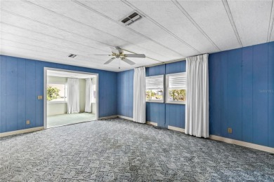 Well-maintained 2-bedroom, 2-bath manufactured home located in on Zellwood Station Country Club in Florida - for sale on GolfHomes.com, golf home, golf lot