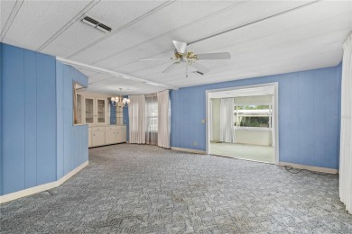 Well-maintained 2-bedroom, 2-bath manufactured home located in on Zellwood Station Country Club in Florida - for sale on GolfHomes.com, golf home, golf lot