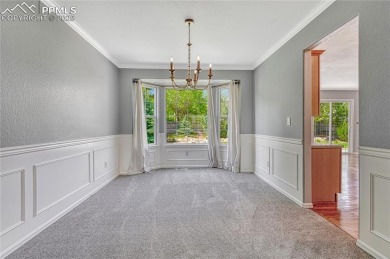Nestled on a tree-lined street in the heart of District 20 and on Pine Creek Golf Club in Colorado - for sale on GolfHomes.com, golf home, golf lot