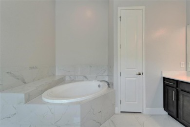 814 Manns Harbor Blvd | 6 Beds | 6 Baths | 5,861 Sq Ft | 100' on Apollo Beach Golf and Sea Club in Florida - for sale on GolfHomes.com, golf home, golf lot