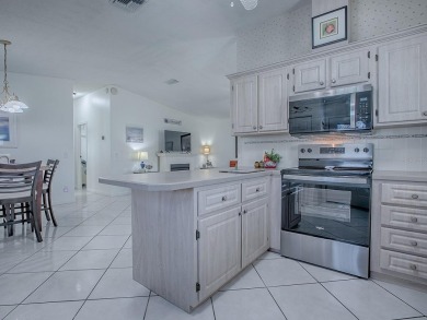 In the heart of The Villages, an exquisite retreat awaits those on El Diablo Executive Golf Course in Florida - for sale on GolfHomes.com, golf home, golf lot