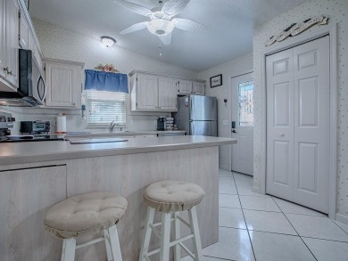 In the heart of The Villages, an exquisite retreat awaits those on El Diablo Executive Golf Course in Florida - for sale on GolfHomes.com, golf home, golf lot