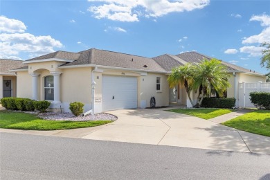 Charming, Block  Stucco, Courtyard Villa on a Corner Lot in on The Links of Spruce Creek in Florida - for sale on GolfHomes.com, golf home, golf lot