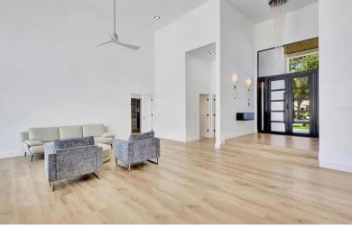 This fully renovated contemporary estate is nestled in the on Broken Sound Golf and Club  in Florida - for sale on GolfHomes.com, golf home, golf lot