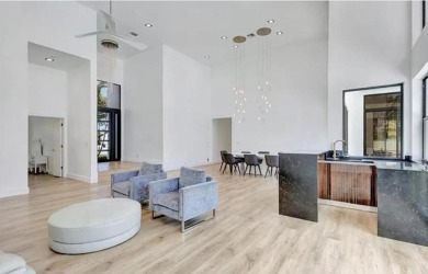 This fully renovated contemporary estate is nestled in the on Broken Sound Golf and Club  in Florida - for sale on GolfHomes.com, golf home, golf lot