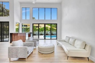 This fully renovated contemporary estate is nestled in the on Broken Sound Golf and Club  in Florida - for sale on GolfHomes.com, golf home, golf lot