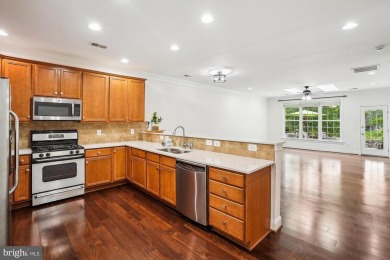 Are you ready for low maintenance and main level living, but on Regency At Dominion Valley Country Club in Virginia - for sale on GolfHomes.com, golf home, golf lot
