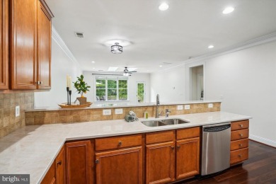 Are you ready for low maintenance and main level living, but on Regency At Dominion Valley Country Club in Virginia - for sale on GolfHomes.com, golf home, golf lot