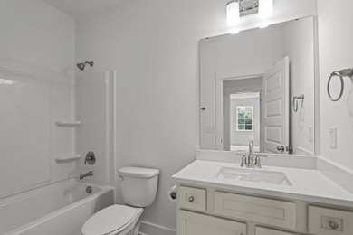 Welcome to your dream home in the prestigious, amenity-rich on Woodside Plantation Country Club in South Carolina - for sale on GolfHomes.com, golf home, golf lot