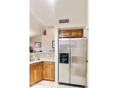 Significantly altered 3BR, 2BA Solano model on the walking path on Oakwood Golf Club  in Arizona - for sale on GolfHomes.com, golf home, golf lot