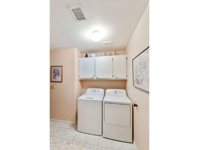 Significantly altered 3BR, 2BA Solano model on the walking path on Oakwood Golf Club  in Arizona - for sale on GolfHomes.com, golf home, golf lot