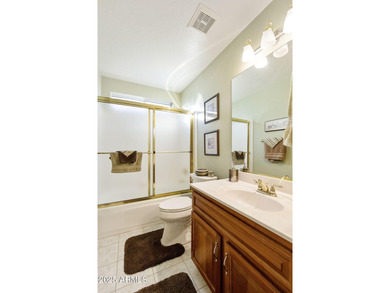 Significantly altered 3BR, 2BA Solano model on the walking path on Oakwood Golf Club  in Arizona - for sale on GolfHomes.com, golf home, golf lot