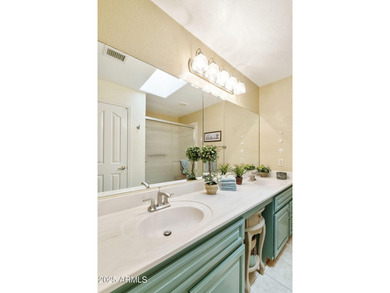 Significantly altered 3BR, 2BA Solano model on the walking path on Oakwood Golf Club  in Arizona - for sale on GolfHomes.com, golf home, golf lot