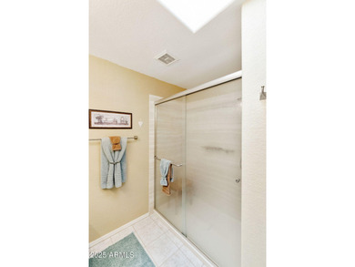 Significantly altered 3BR, 2BA Solano model on the walking path on Oakwood Golf Club  in Arizona - for sale on GolfHomes.com, golf home, golf lot