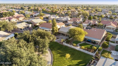 Significantly altered 3BR, 2BA Solano model on the walking path on Oakwood Golf Club  in Arizona - for sale on GolfHomes.com, golf home, golf lot
