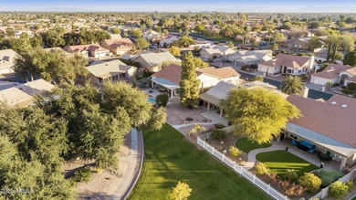 Significantly altered 3BR, 2BA Solano model on the walking path on Oakwood Golf Club  in Arizona - for sale on GolfHomes.com, golf home, golf lot