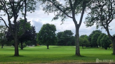 This bright and airy, move-in-ready spacious home features a on Rossmoor Golf Club in New Jersey - for sale on GolfHomes.com, golf home, golf lot