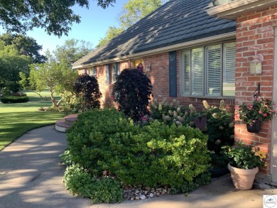 This exquisite 1.5-story, 3-bedroom, 3.5 bath home offers luxury on Sedalia Country Club in Missouri - for sale on GolfHomes.com, golf home, golf lot