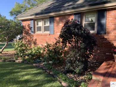 This exquisite 1.5-story, 3-bedroom, 3.5 bath home offers luxury on Sedalia Country Club in Missouri - for sale on GolfHomes.com, golf home, golf lot