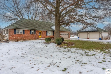 This exquisite 1.5-story, 3-bedroom, 3.5 bath home offers luxury on Sedalia Country Club in Missouri - for sale on GolfHomes.com, golf home, golf lot