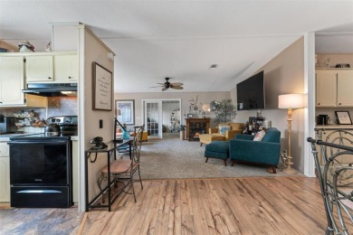 Welcome to carefree Florida living in the sought-after 55+ gated on Zellwood Station Country Club in Florida - for sale on GolfHomes.com, golf home, golf lot