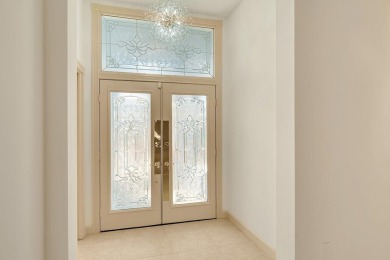 Absolutely Beautiful & stylish LAKEFRONT Divosta built home on Monarch Country Club in Florida - for sale on GolfHomes.com, golf home, golf lot