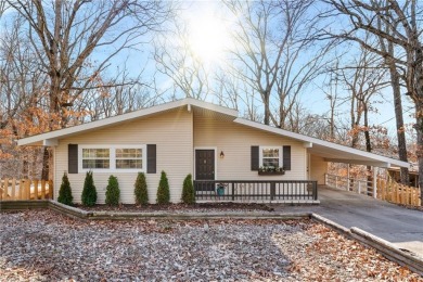 Nestled in a peaceful setting near Lake Windsor, this charming on Bella Vista Country Club - Berksdale in Arkansas - for sale on GolfHomes.com, golf home, golf lot