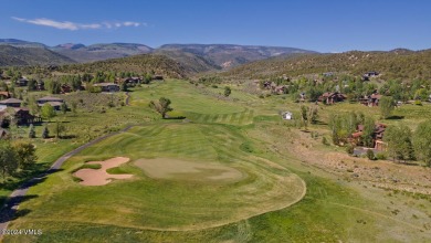 This stunning single-family residence offers 360-degree views of on Eagle Ranch in Colorado - for sale on GolfHomes.com, golf home, golf lot