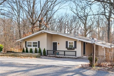 Nestled in a peaceful setting near Lake Windsor, this charming on Bella Vista Country Club - Berksdale in Arkansas - for sale on GolfHomes.com, golf home, golf lot