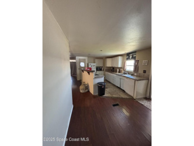 Residential or Investor Opportunity. This classic 2-bedroom, 2 on Barefoot Bay Golf Course in Florida - for sale on GolfHomes.com, golf home, golf lot