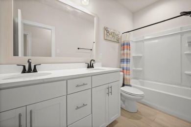 Situated in the prestigious Pelican Crossing subdivision on Pelican Point Golf Club in Louisiana - for sale on GolfHomes.com, golf home, golf lot